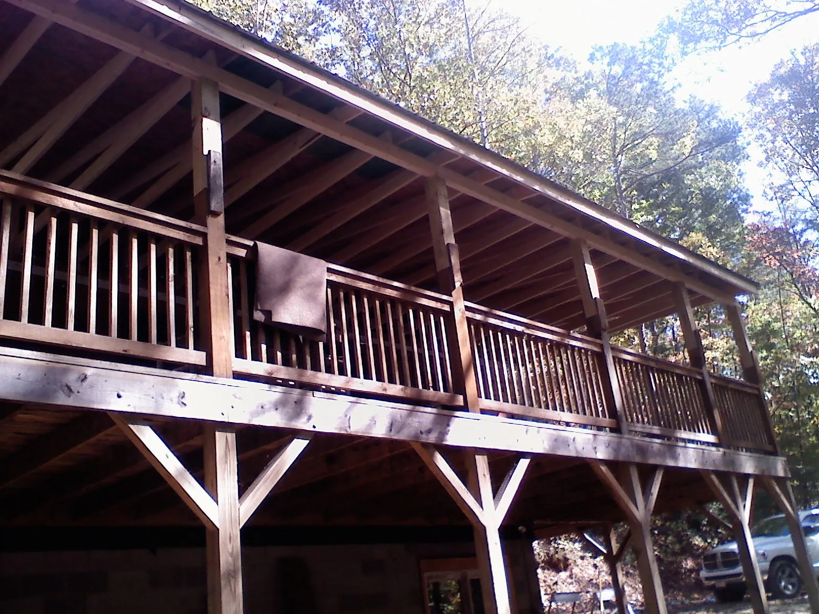 Timber framing under a new elevated porch and deck — Roof Leak Repair in Wisner by Roofing Brothers